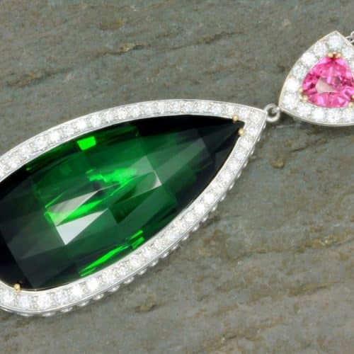 Elegant pendant with green and pink gemstones