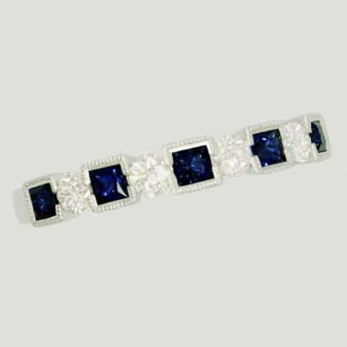 Elegant ring with blue gemstones