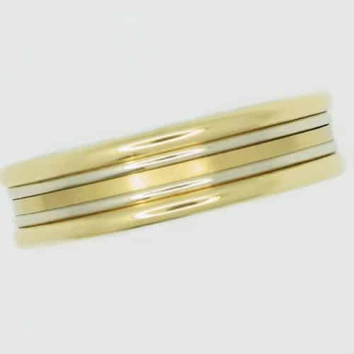 Gold ring with two silver stripes