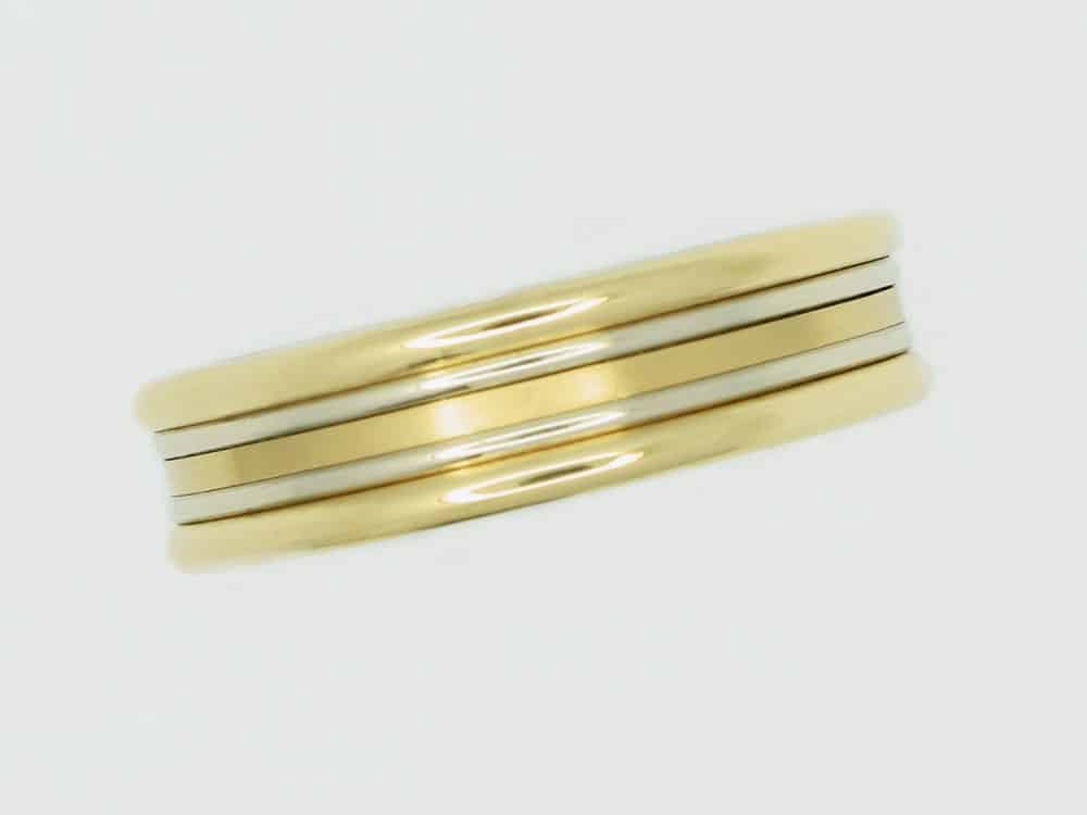 131188 4 Gold ring with two silver stripes