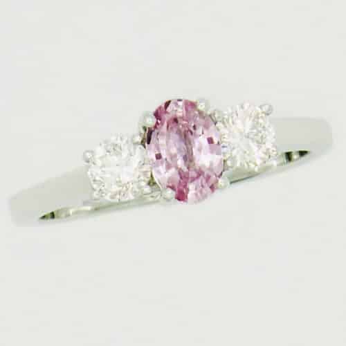 Ring with pink and white gemstones